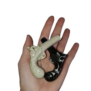 Cool little vintage ceramic pistol salt and pepper shakers